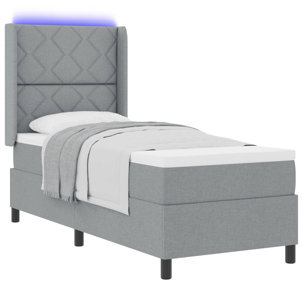 Letto a molle con materasso e luce LED grigio chiaro 80x200 cm in tessuto