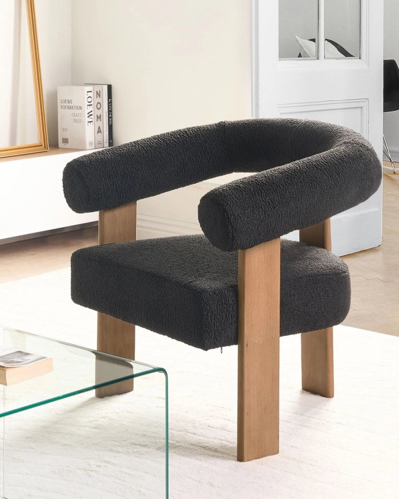 Poltrona nero e marrone scuro con rivestimento in bouclé design retrò gambe in legno per soggiorno