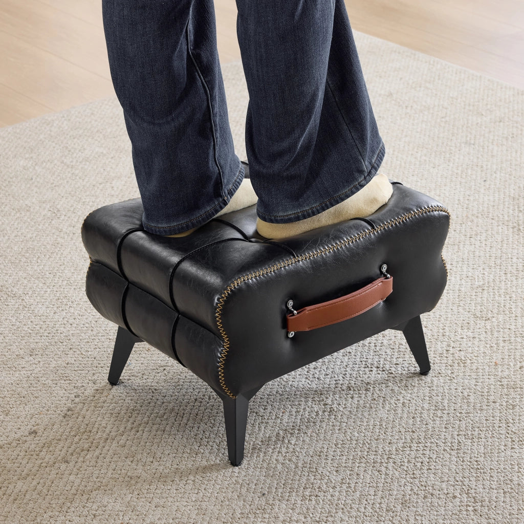 Pouf poggiapiedi portatile in PU nero con struttura in acciaio e maniglia laterale