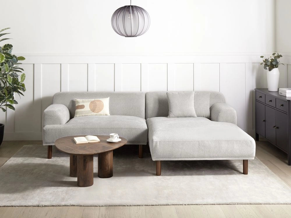 Divano ad angolo sinistro in tessuto grigio chiaro lato sinistro stile minimalista