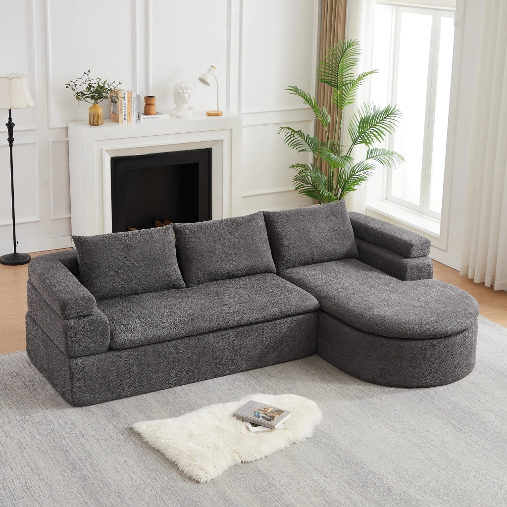 Divano angolare con chaise longue in chenille con bracciolo a gradini e schienali imbottiti grigio antracite