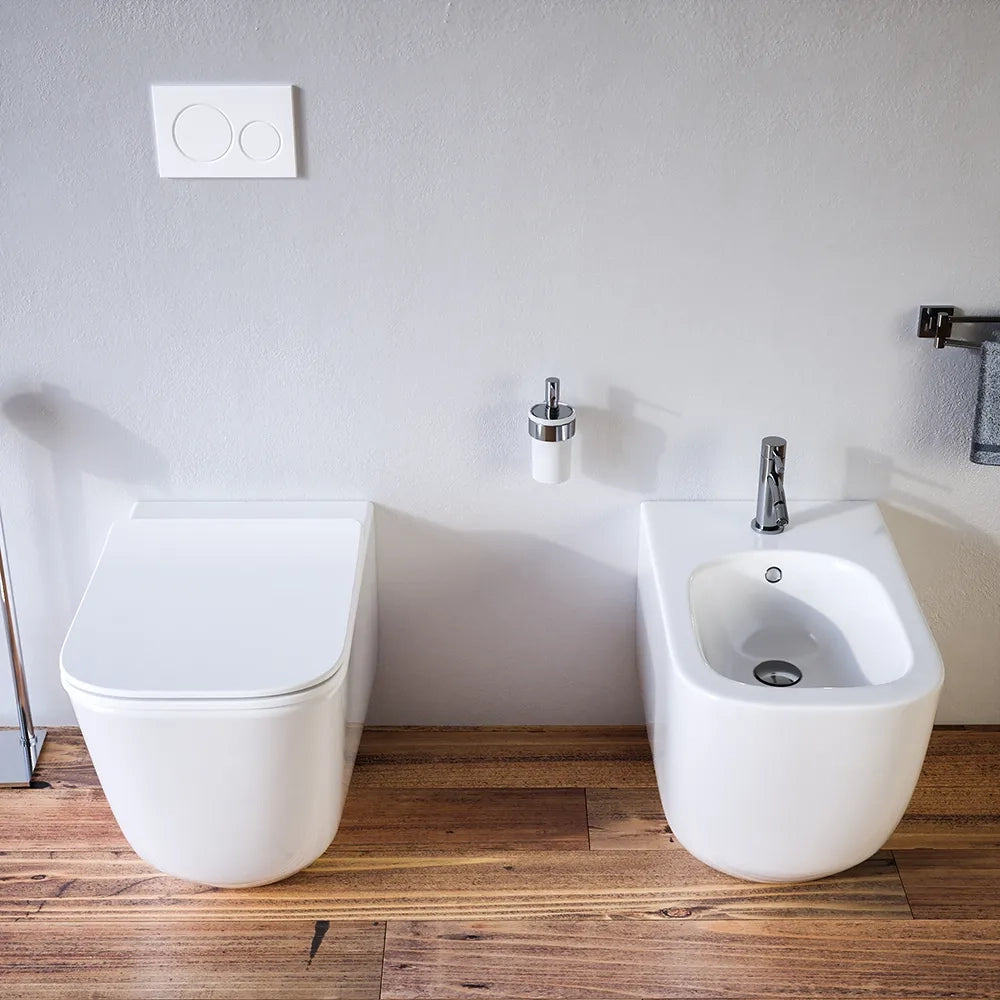 Sanitari filomuro in ceramica bianco lucido vaso tornado silent flush sedile soft-close e bidet | Riga