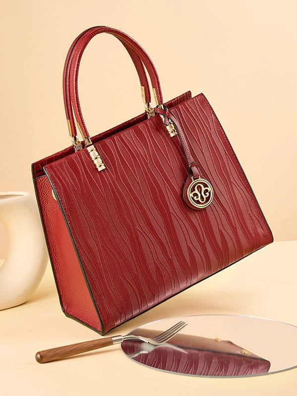 Borsa a tracolla da donna in vera pelle, colore rosso.