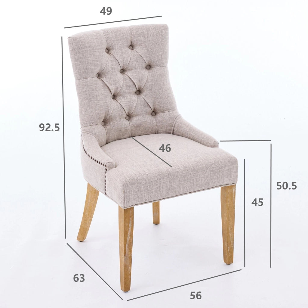 Set di 2 sedie da pranzo imbottite in tessuto con gambe in rovere e borchie decorative