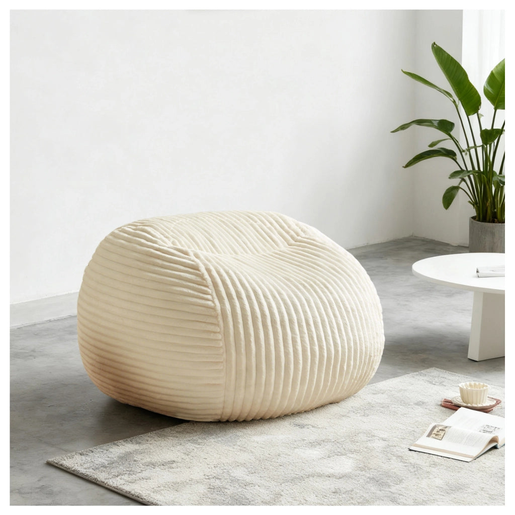 Pouf sacco con imbottitura in memory foam, schienale ergonomico e braccioli allargati in flanella beige