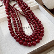 Collana di perle rosse fatta a mano