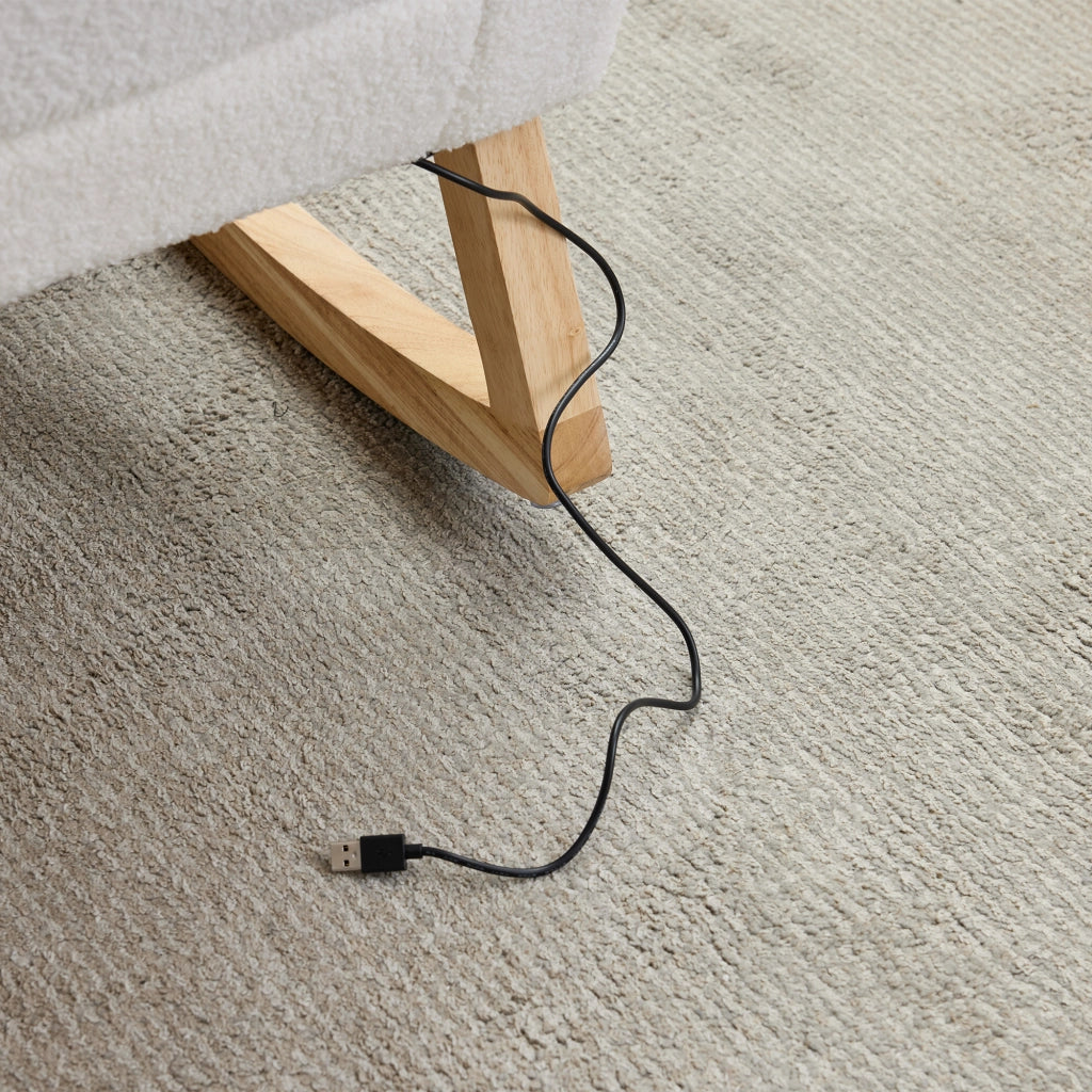 Sedia a dondolo con USB; tasche laterali e poggiapiedi estraibile in bouclé bianco