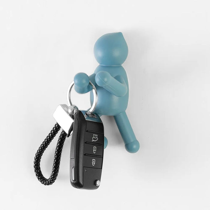 Appendino da muro in ABS turchese con due modalità di fissaggio  Bruce