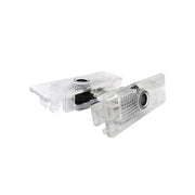 Kit Luci Led Logo Proiettori Auto Portiere BMW E53 X5 E39 Senza Modifica