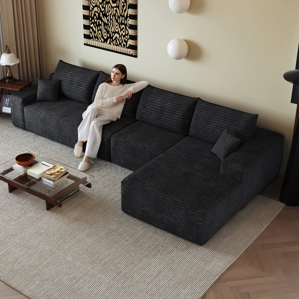 Divano angolare modulare con chaise longue e assise profonda in tessuto a coste nero senza montaggio per soggiorno