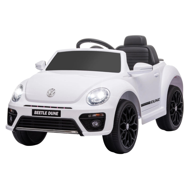 Macchina elettrica per bambini, modello Maggiolino VW, velocit¨¤ 3-5 km/h, con telecomando e musica, colore bianco.