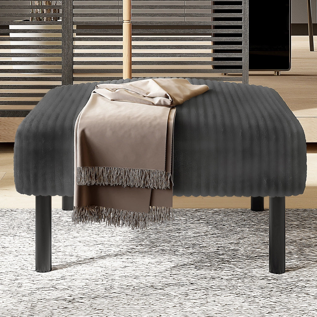 Pouf in velluto a coste grigio con struttura in metallo