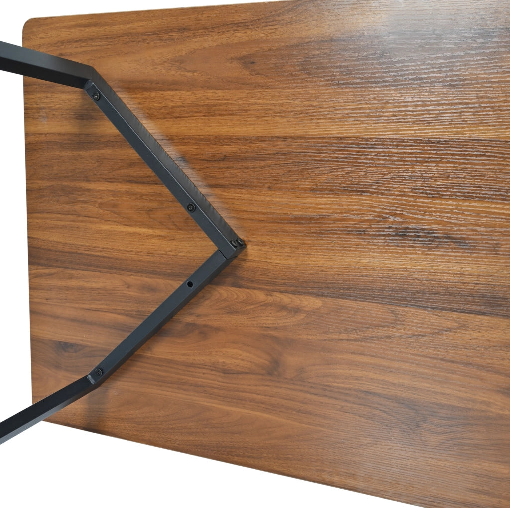 Tavolo da pranzo rettangolare 117x68x75 cm in MDF con gambe in metallo; nero e colore noce