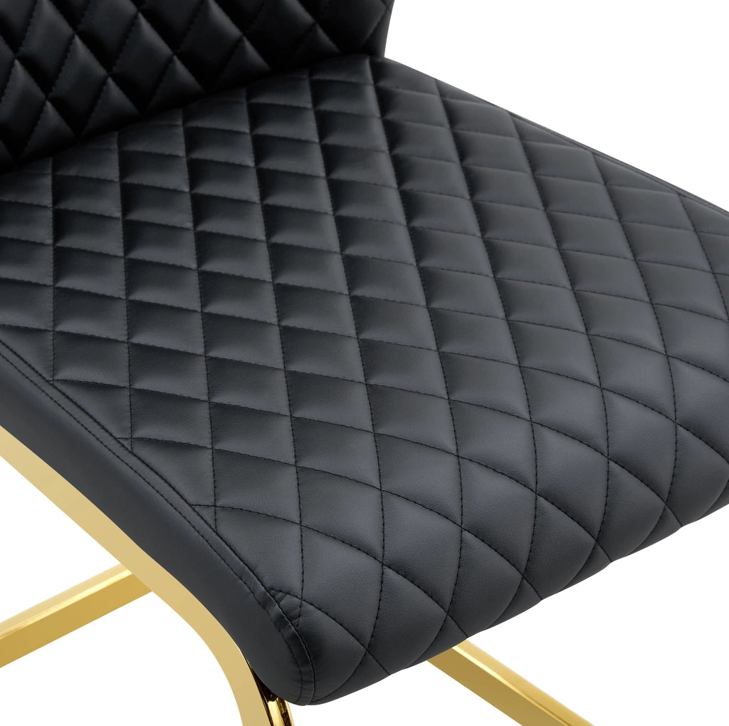 Set 2 sedie da pranzo in PU nero con motivo trapuntato; schienale alto 100 cm; struttura in metallo oro