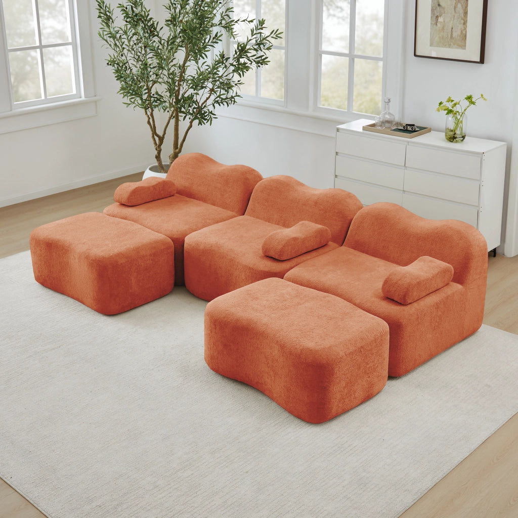 Divano modulare a U 3 posti con 2 pouf seduta profonda design ondulato braccioli mobili in velluto arancione