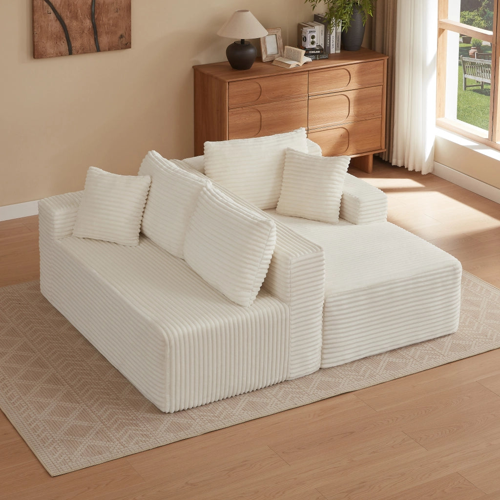 Divano modulare a L con sedute ampie e cuscini sfoderabili in schiuma e molle per salotto bianco 252.5 × 163.0 × 65.0 cm