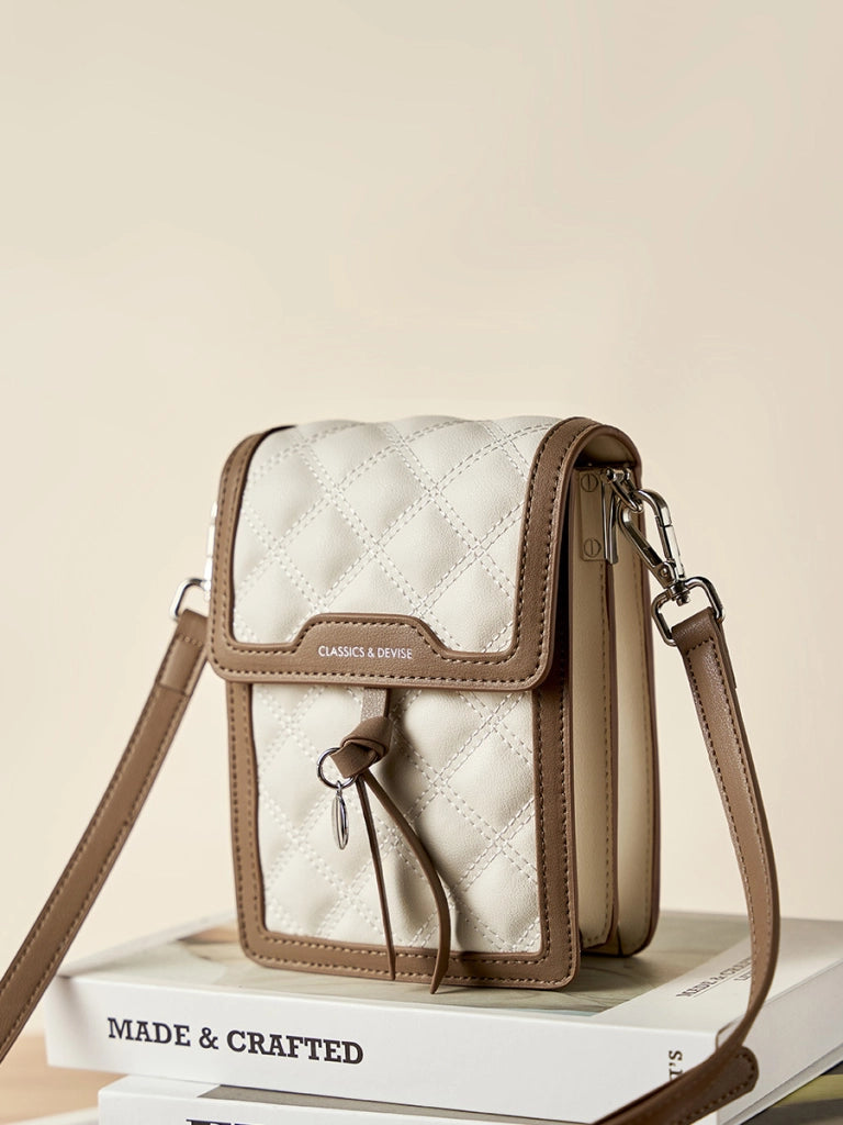 Borsa a tracolla da donna alla moda in vera pelle, colore bianco.