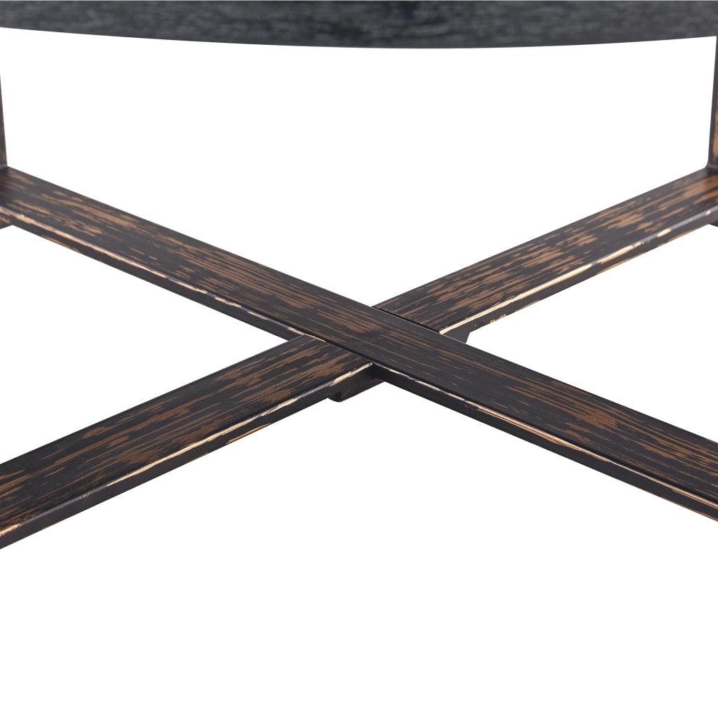 Tavolino rotondo con piano da 68 cm; struttura incrociata in metallo; piedini effetto legno; per soggiorno; 68 × 39 cm