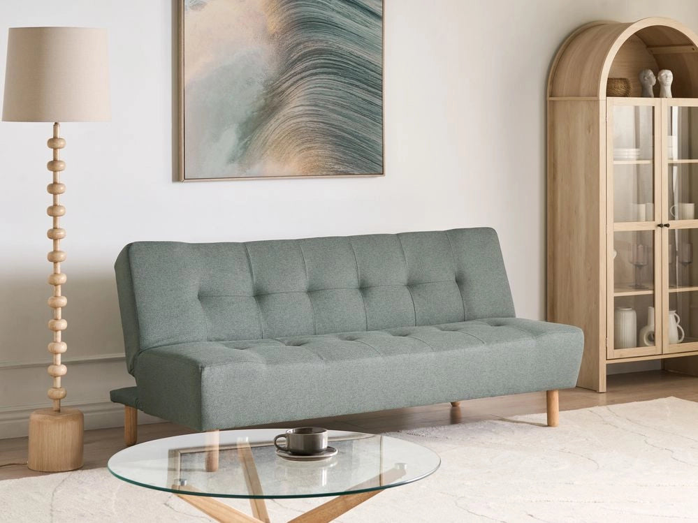 Divano letto in tessuto verde con gambe in legno chiaro 3 posti in stile scandinavo