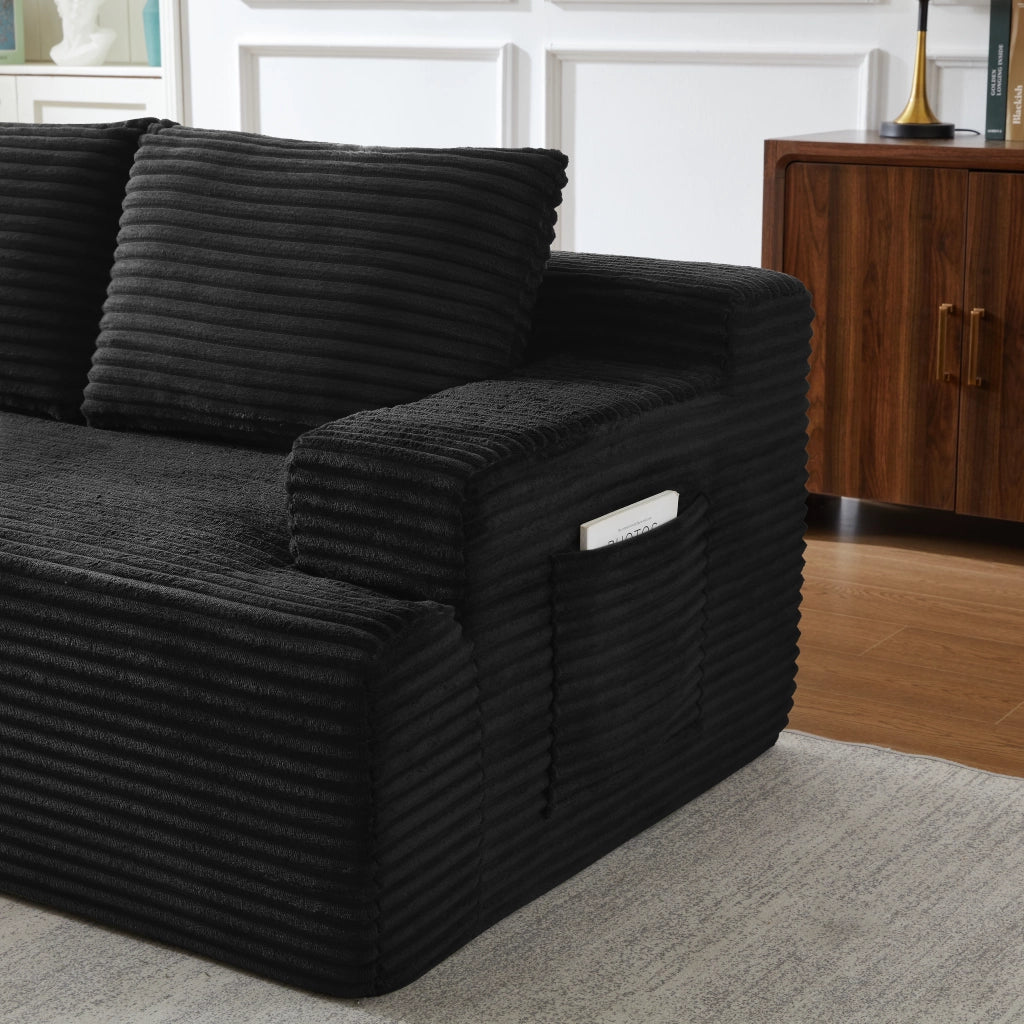 Divano con schiuma e molle insacchettate in corduroy nero