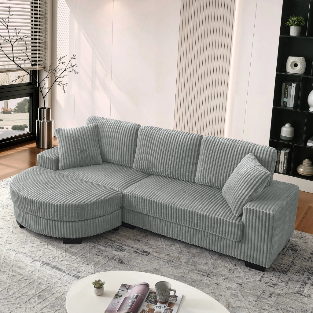 Divano angolare modulare a L con pouf ovale e 2 cuscini in corduroy, seduta confortevole grigio 256.5 × 133.5 × 89 cm