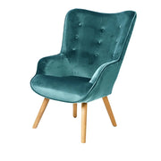 Poltrona da salotto in velluto blu petrolio con piedi in legno collezione ENJOY. Stile scandinavo.