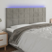 Testiera a LED-Testata con LED Grigio Chiaro 160x5x118/128 cm in Velluto 421433