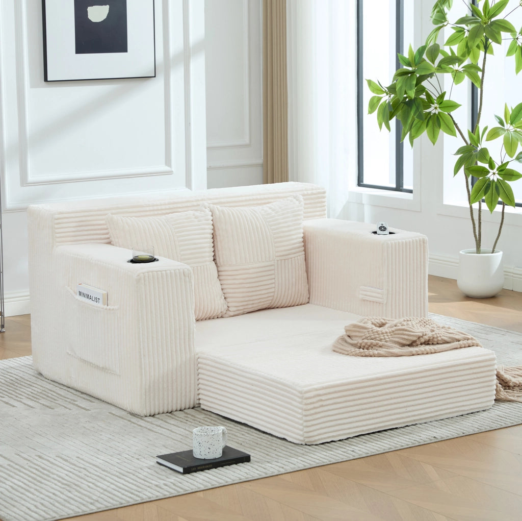 Divano pouf in velluto a coste beige con tasche laterali e 2 cuscini HOMVRA