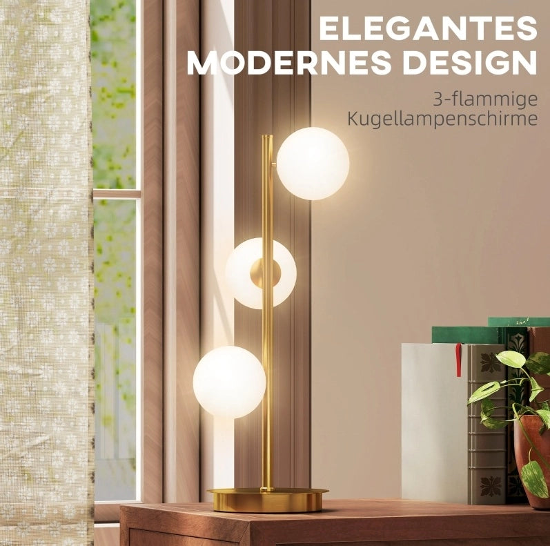Lampada da tavolo con tre sfere color crema e finitura ottone anticato
