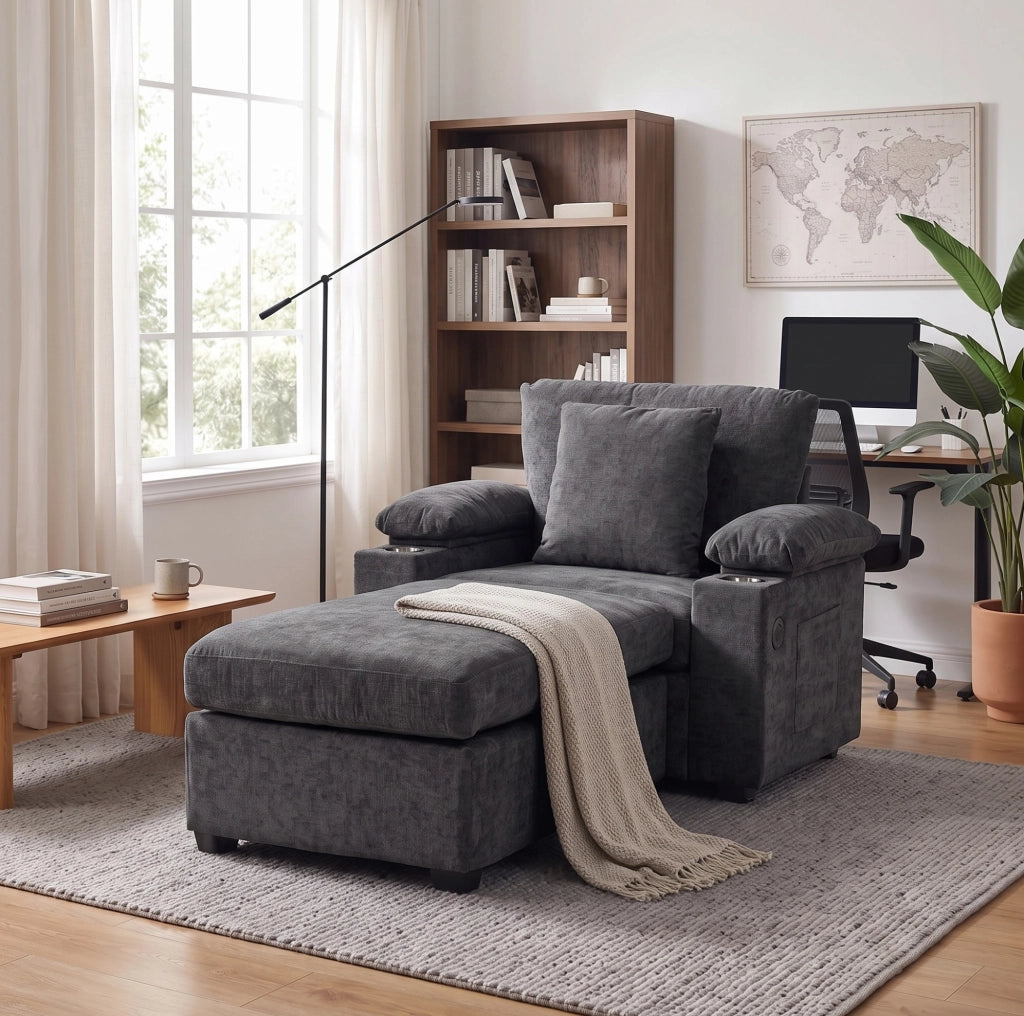 Divano trasformabile grigio scuro con pouf, porta USB e vani contenitori