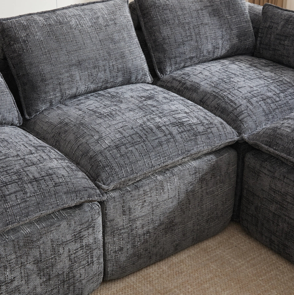 Divano modulare 3 posti in ciniglia grigio scuro con pouf e cuscini