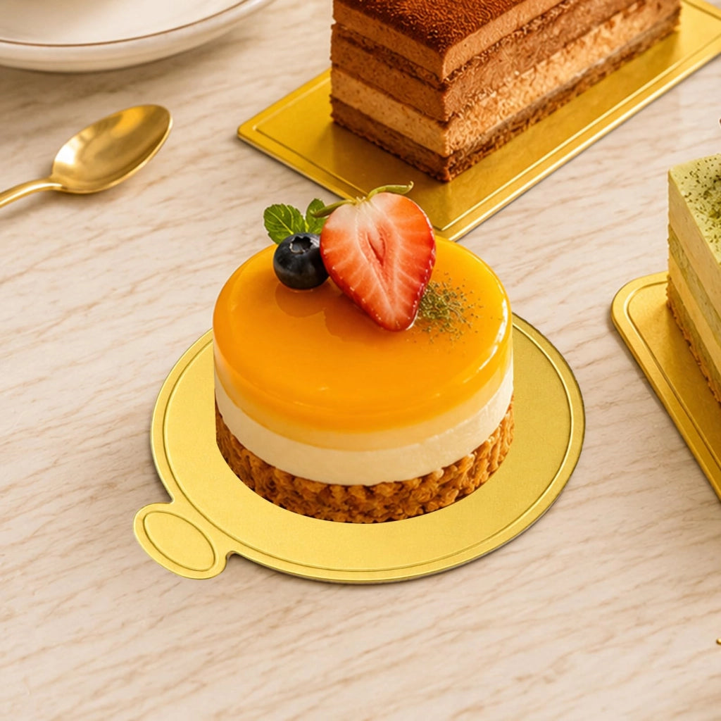 200 mini basi per torta in cartone, dorate, 4 forme, incluse 3 spatole