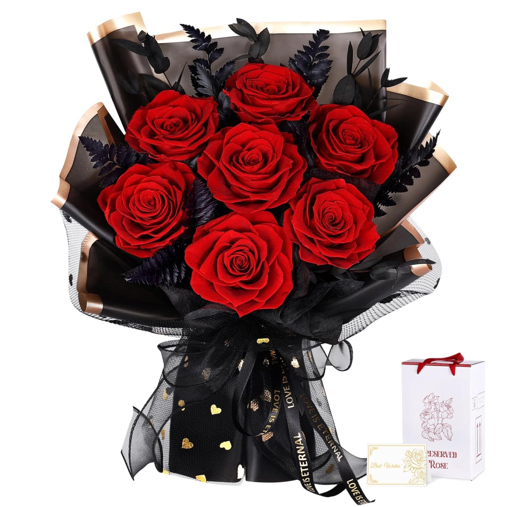 Composizione floreale con 7 rose rosse a lunga durata, elegantemente confezionata in nero