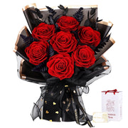 Composizione floreale con 7 rose rosse a lunga durata, elegantemente confezionata in nero