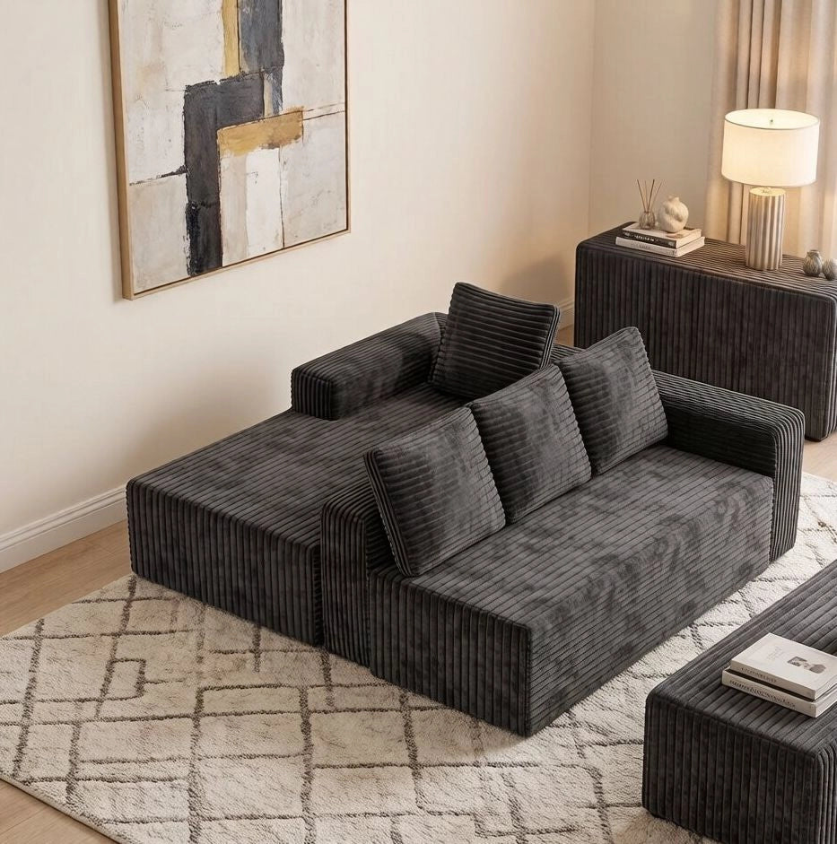 Divano modulare a L con chaise longue in velluto a coste grigio