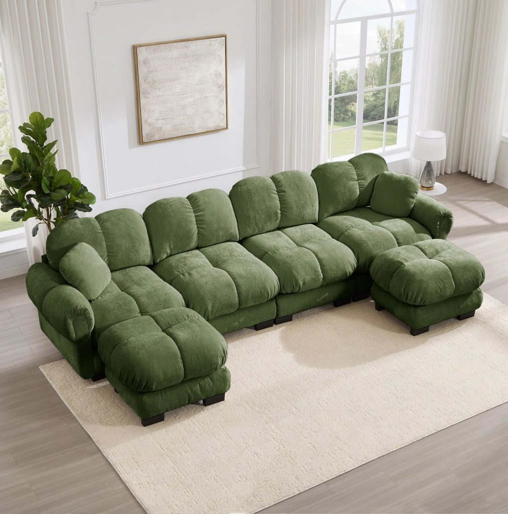 Divano modulare in ciniglia verde con pouf mobili