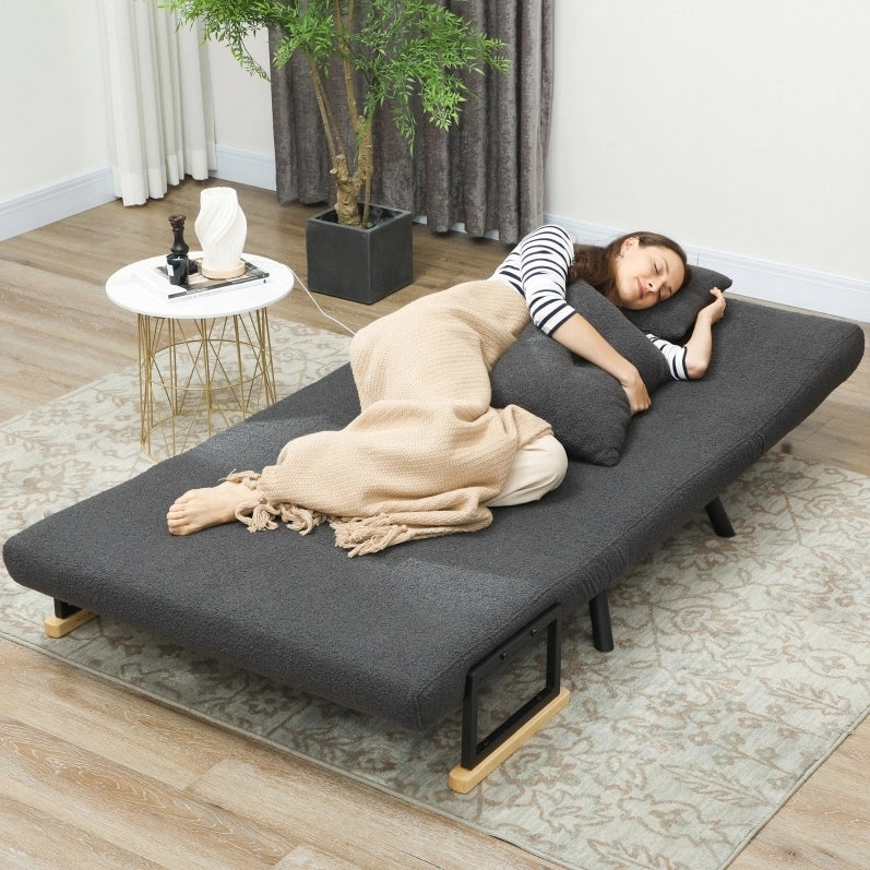 Divano letto trasformabile in tessuto grigio scuro con 2 cuscini