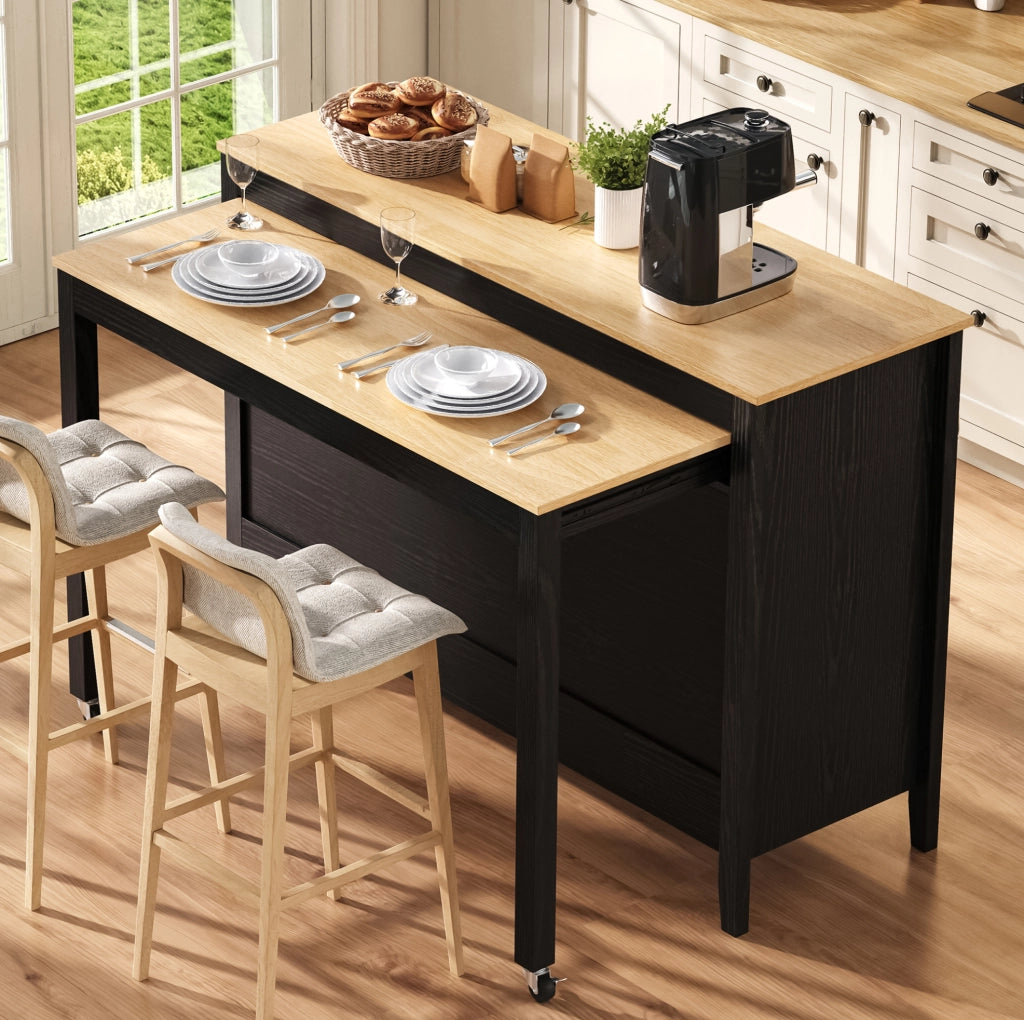 Isola cucina nera con tavolo estraibile e vani contenitore