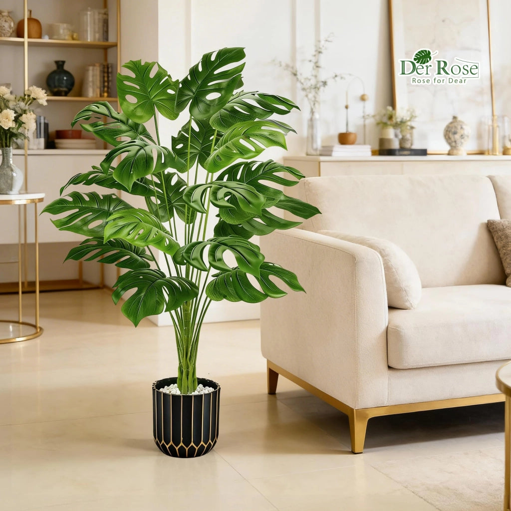 Pianta artificiale Monstera, altezza 112 cm, realizzata in plastica, con vaso nero e dorato