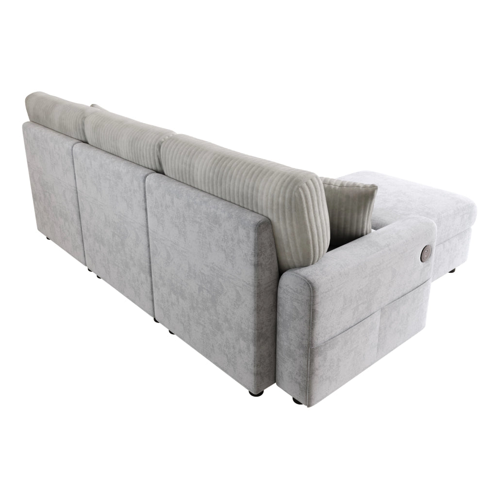 Divano grigio 223x146 cm con pouf, 2 cuscini, USB e USB-C in ciniglia e velluto a coste