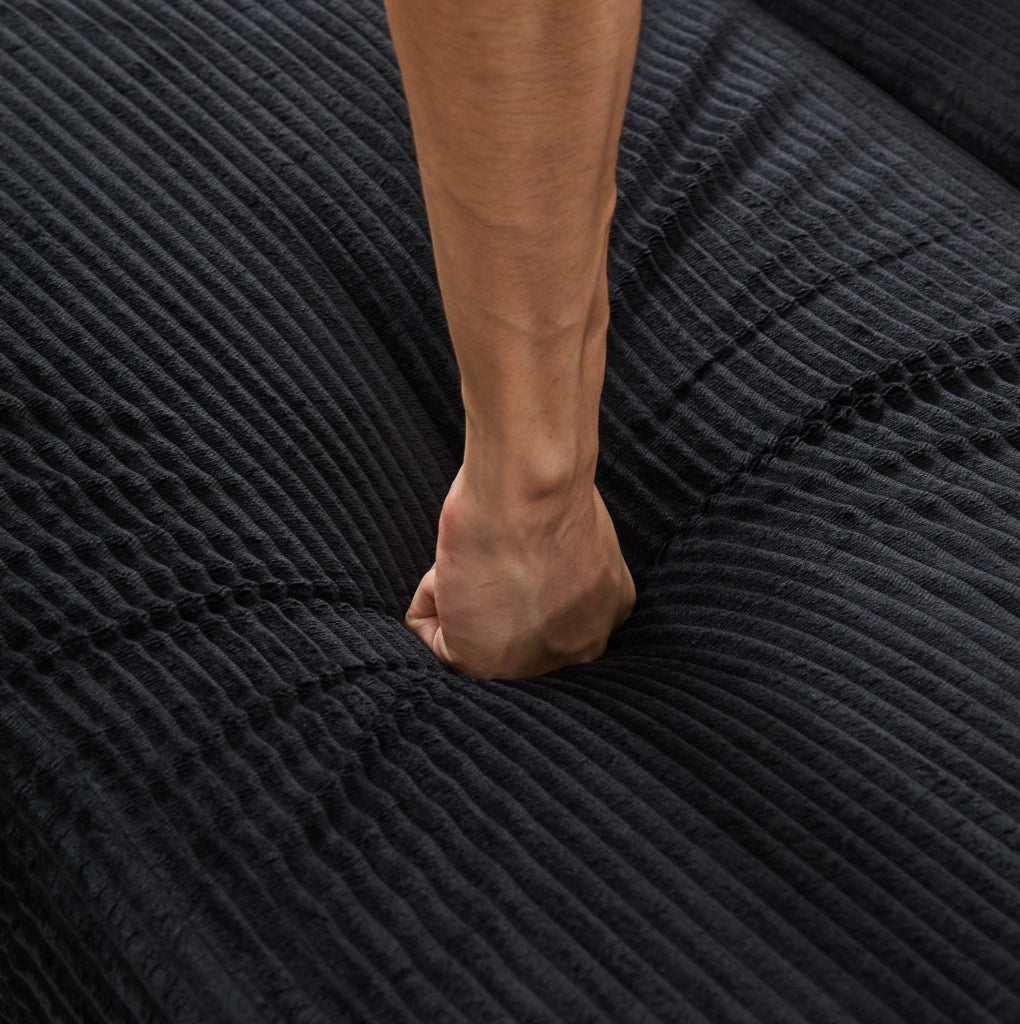 Chaise longue nera con vano contenitore e rivestimento a coste