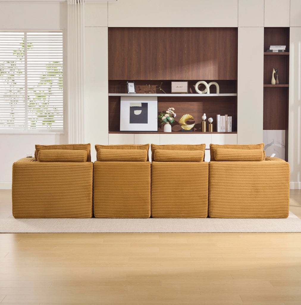 Divano modulare arancione in velluto a coste con pouf e tasche laterali