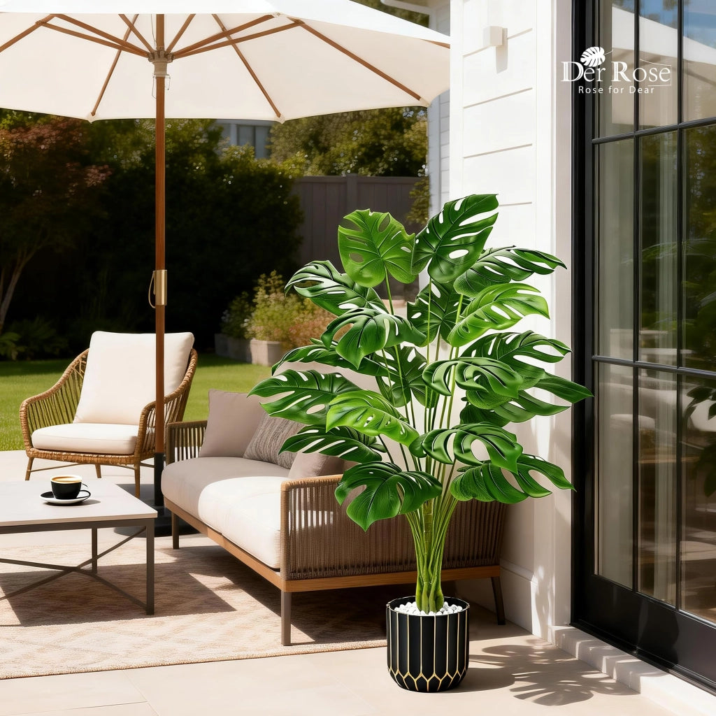 Pianta artificiale Monstera, altezza 112 cm, realizzata in plastica, con vaso nero e dorato