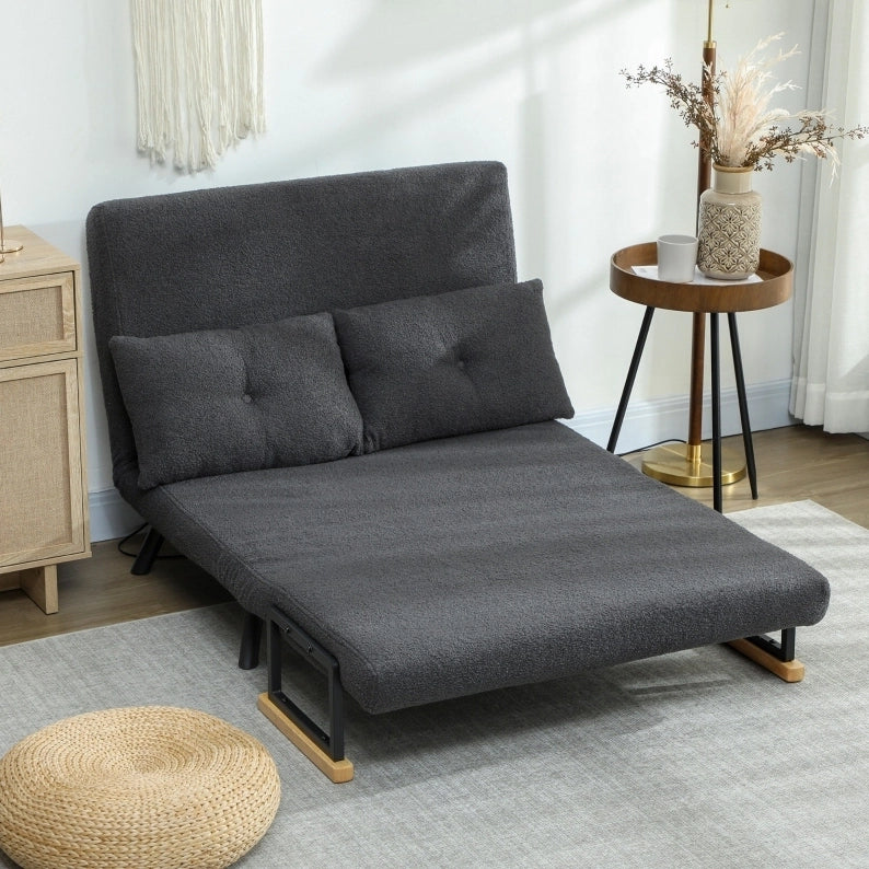 Divano letto trasformabile in tessuto grigio scuro con 2 cuscini
