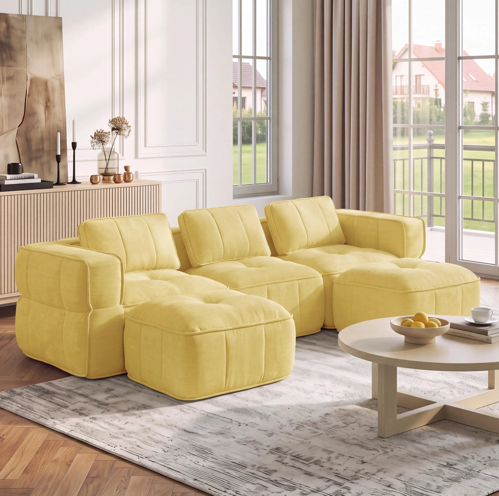 Divano modulare giallo in poliestere con seduta profonda e pouf