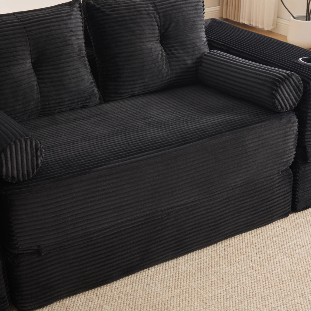 Divano Letto; trasformabile in letto; modulare; in velluto a coste nero; 180x98x80 cm con tasche laterali e portabicchieri