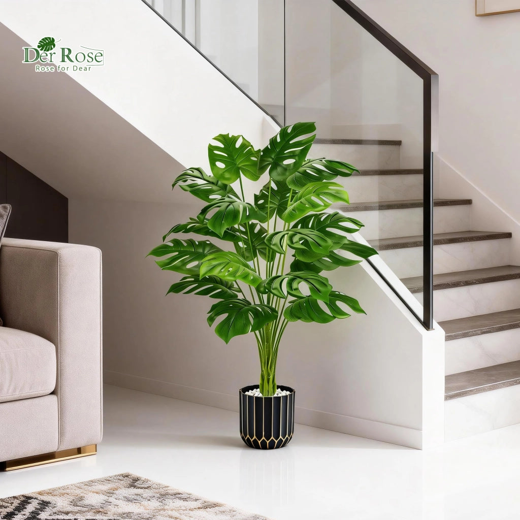 Pianta artificiale Monstera, altezza 112 cm, realizzata in plastica, con vaso nero e dorato