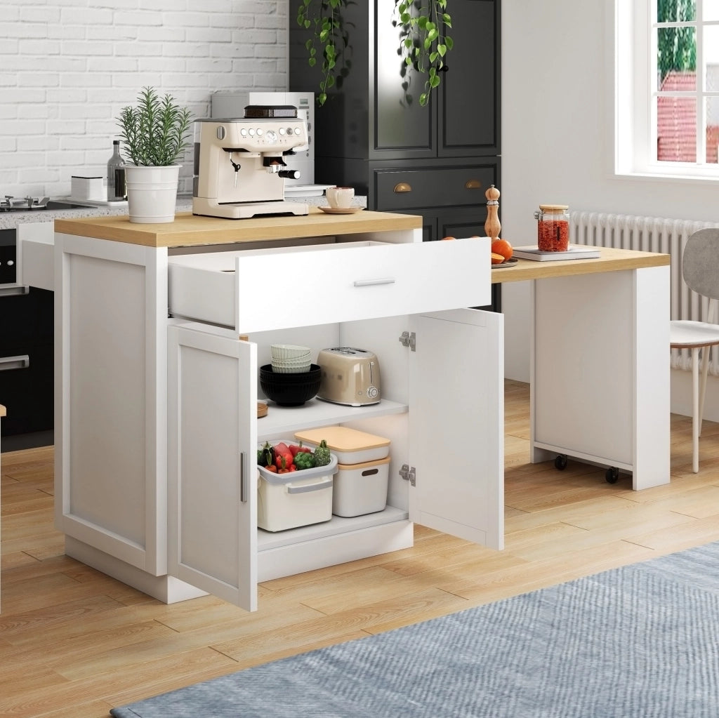 Isola cucina bianca con tavolo estraibile, prese USB e vani