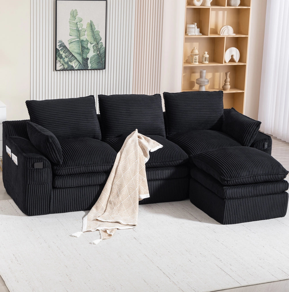 Divano modulare in velluto a coste nero con pouf e tasche laterali