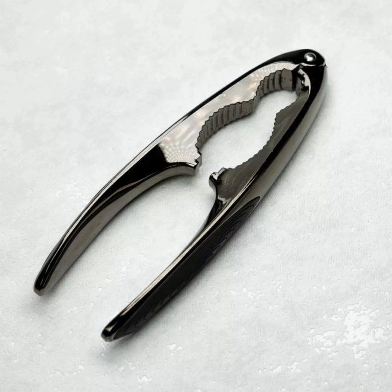 Schiaccianoci Kinghoff KH-1469 con manici in silicone antiscivolo